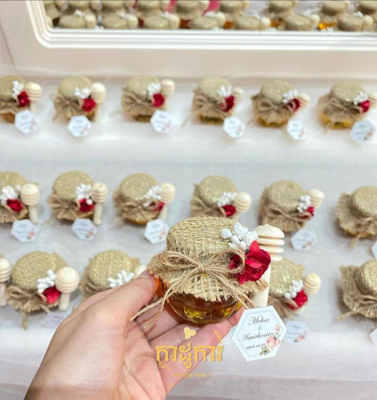 កាដូទឹកឃ្មុំដបមូលរុំក្រចៅ​ ចំណុះ 25ml