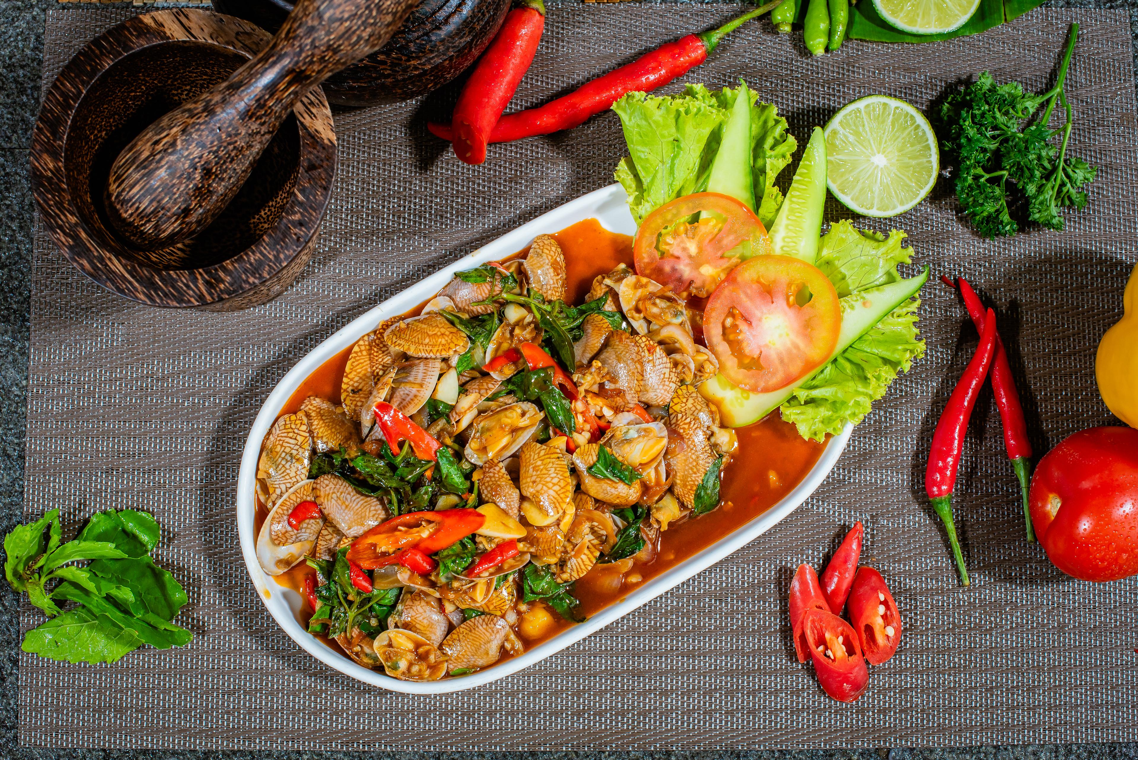 ខ្យងហូលឆាហិល Stir fried spicy white clam  炒辣白蚬